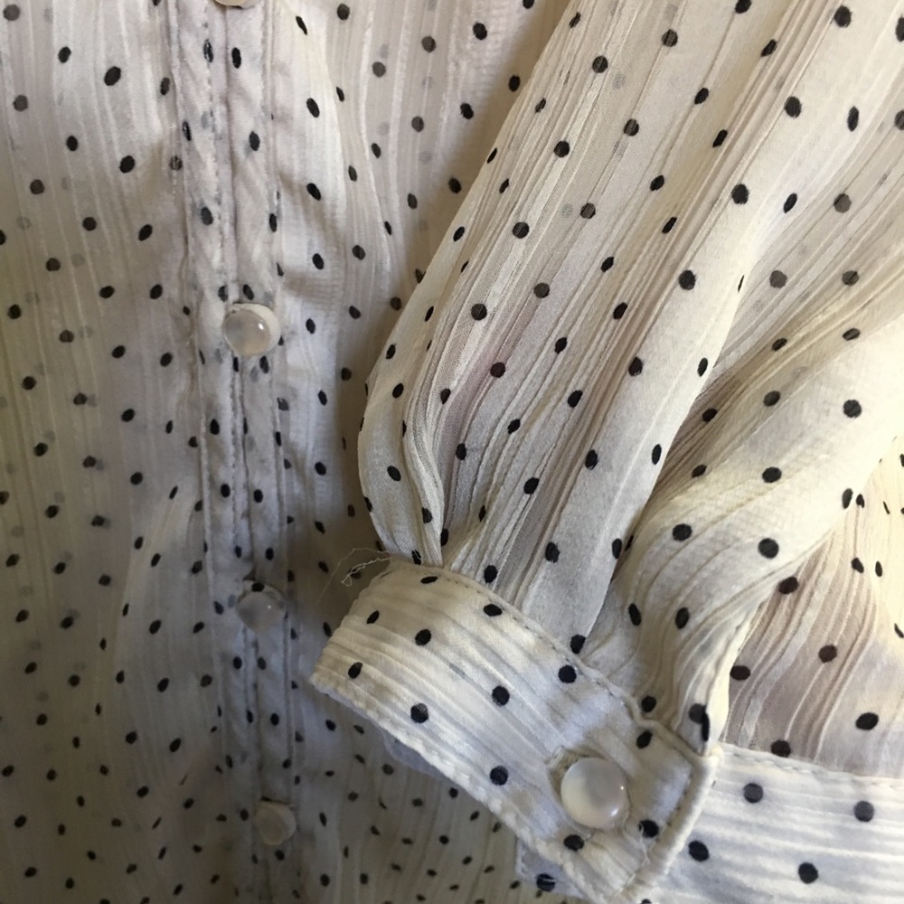 Woman’s plus size button blouse